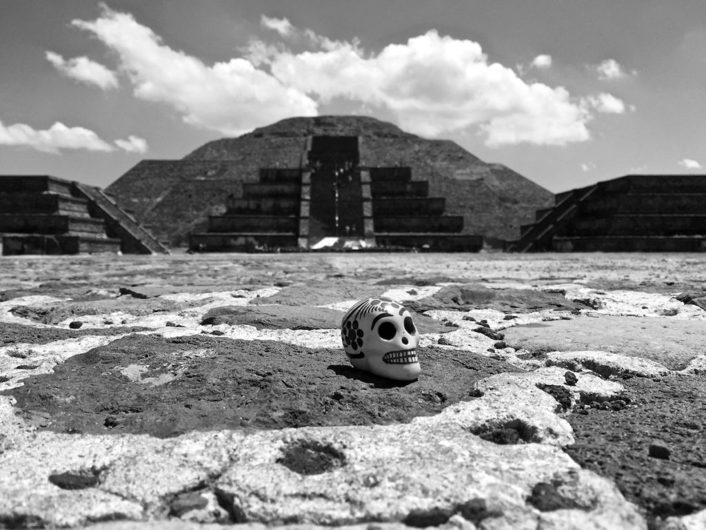 Ceramic skull in front of the pyramid of the moon, Teotihuacan