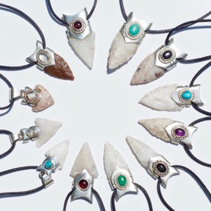A collection of beautiful handmade necklaces out of silver and rare jewels